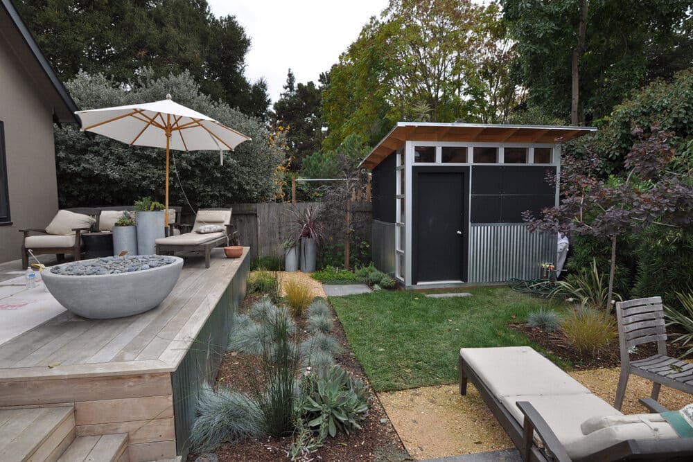 Modern backyard, seating area, shed, garden, Acorn Finance for renovations.